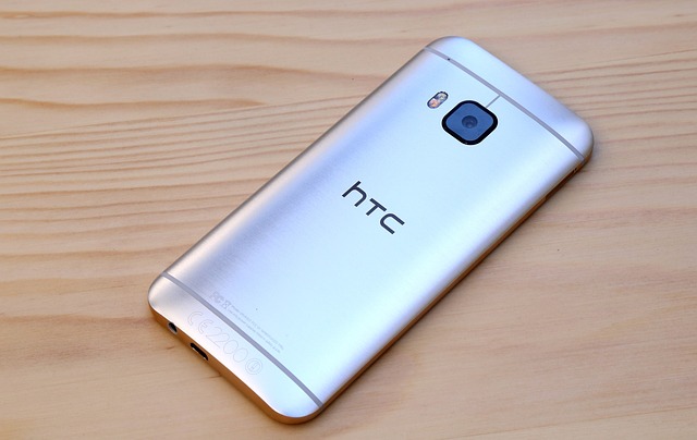 A sleek HTC smartphone featuring a large display and the HTC logo.