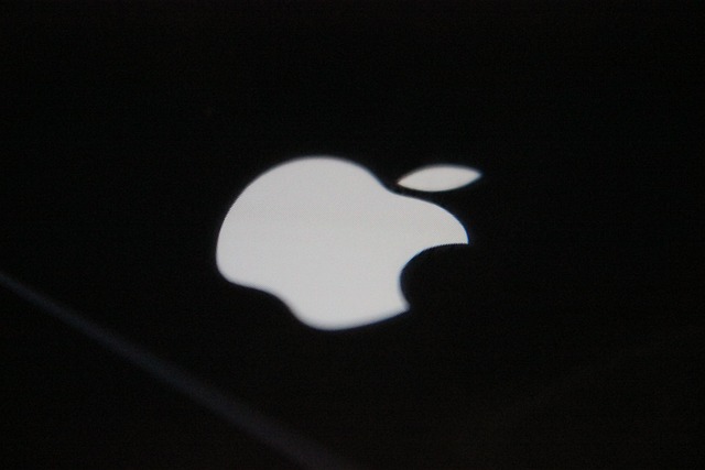 The iconic Apple logo, representing the brand's identity and recognition.