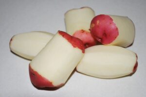 grater or zester to remove potato skin.