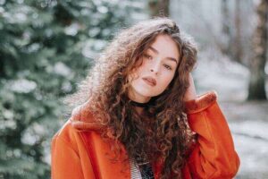 Alt Text: Bottles of five best anti-dandruff shampoos for women.