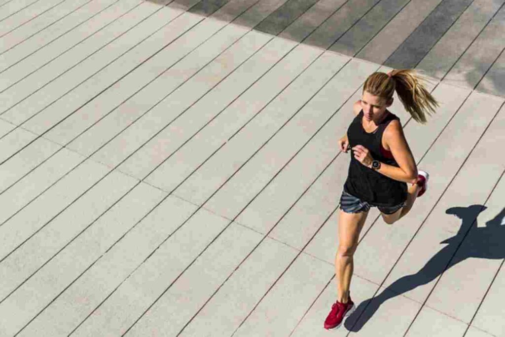 Silhouette of a person exercising.