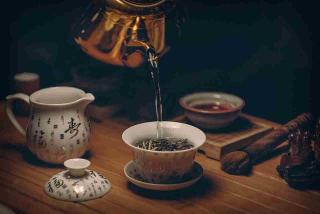 "A cup of green tea with leaves: Exploring its health benefits in depth."