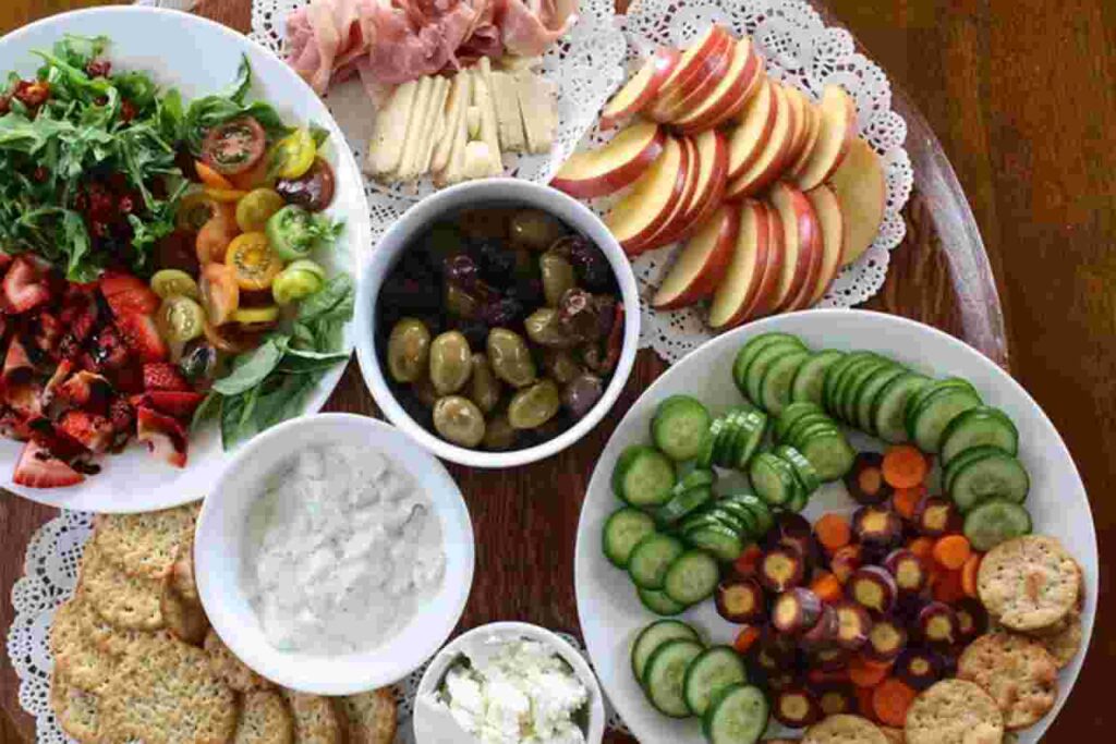 Vibrant assortment of fresh ingredients arranged in a bowl, showcasing the variety of delicious salad recipes.