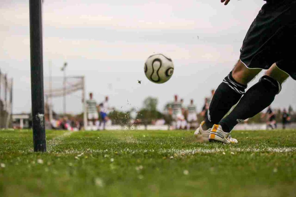 Kylian Mbappé in action on the soccer field.