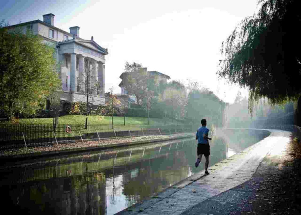 "Person jogging in the morning, enjoying the benefits of early workouts."