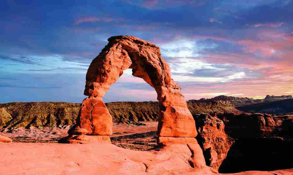 An image featuring various natural wonders from around the world, including waterfalls, mountains, and deserts.