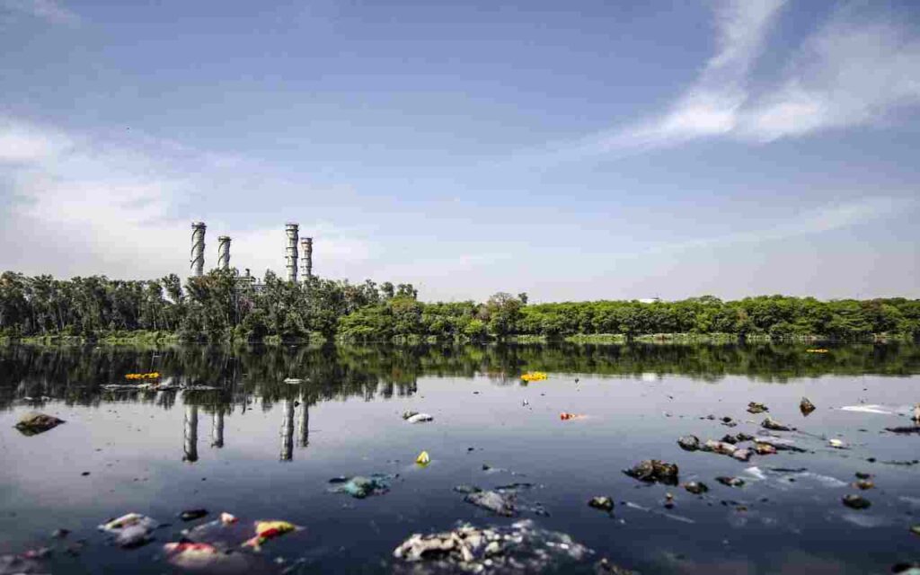 Polluted water flowing through a river.