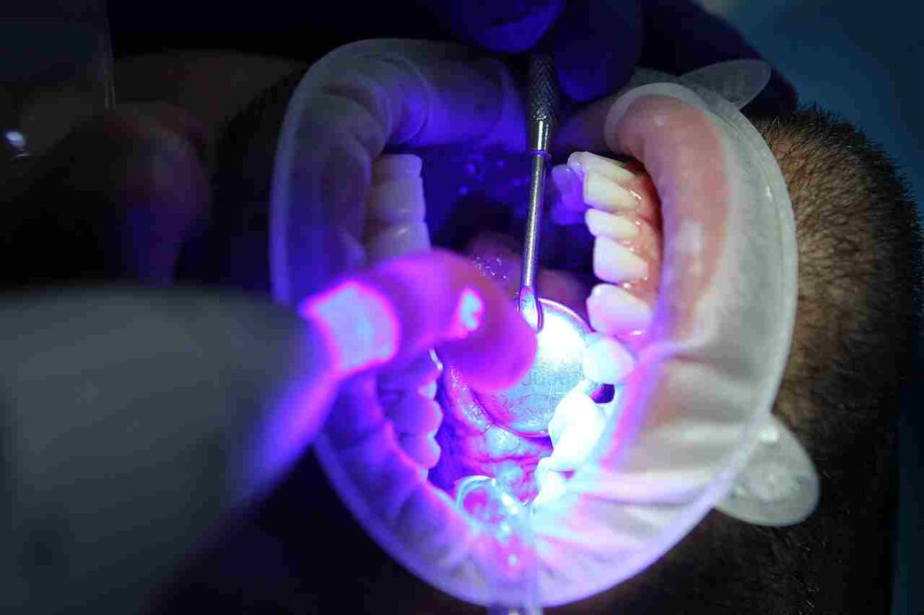 A toothbrush and dental floss, essential tools for oral care.