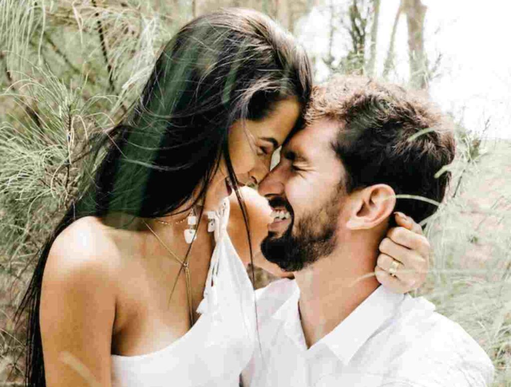 "Smiling couple enjoying quality time together - Daily Habits of Happy Couples"
