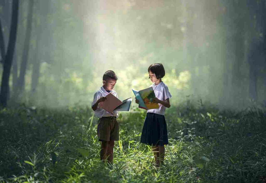 An open book with a graduation cap symbolizing the importance of education.
