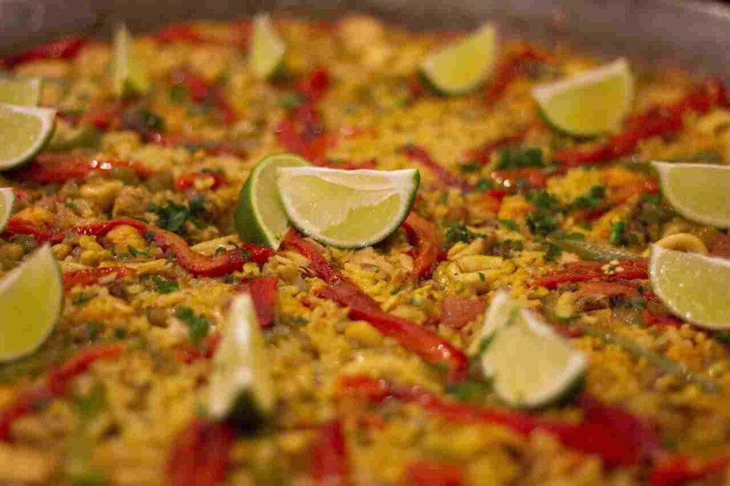 Delicious paella in a traditional pan.