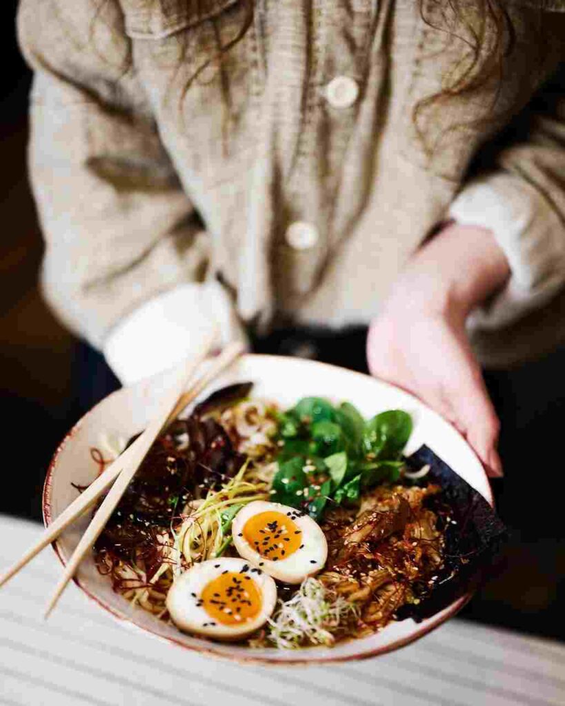 Delicious bowl of ramen with assorted toppings.