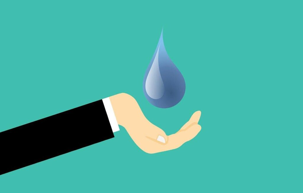 A faucet dripping water. saving water