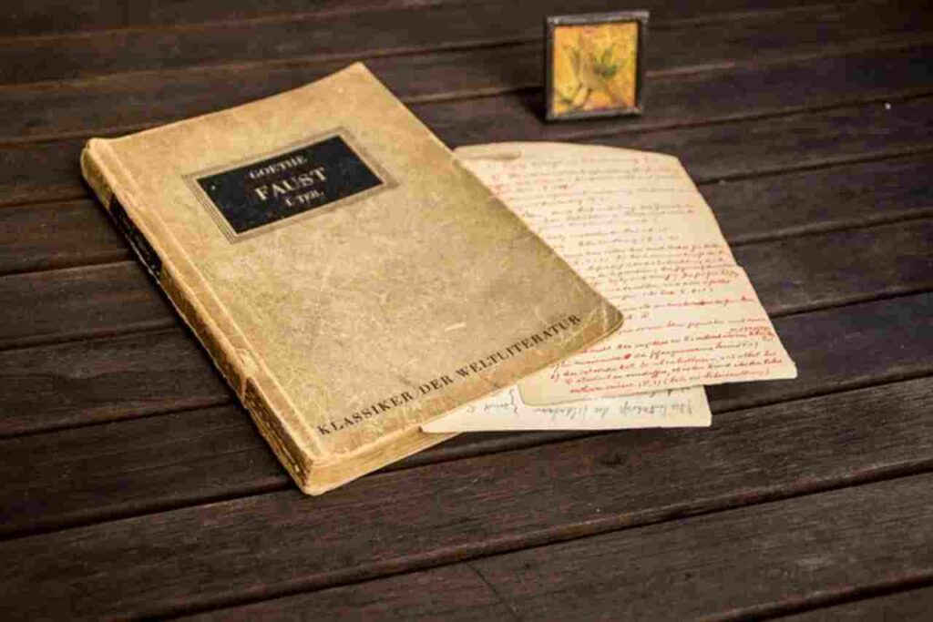 Image: Pen and parchment with Chaucer's quotes.