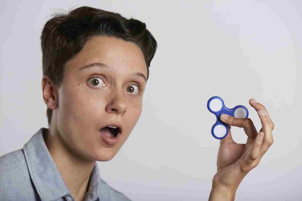 Focused woman working with laptop, surrounded by distractions