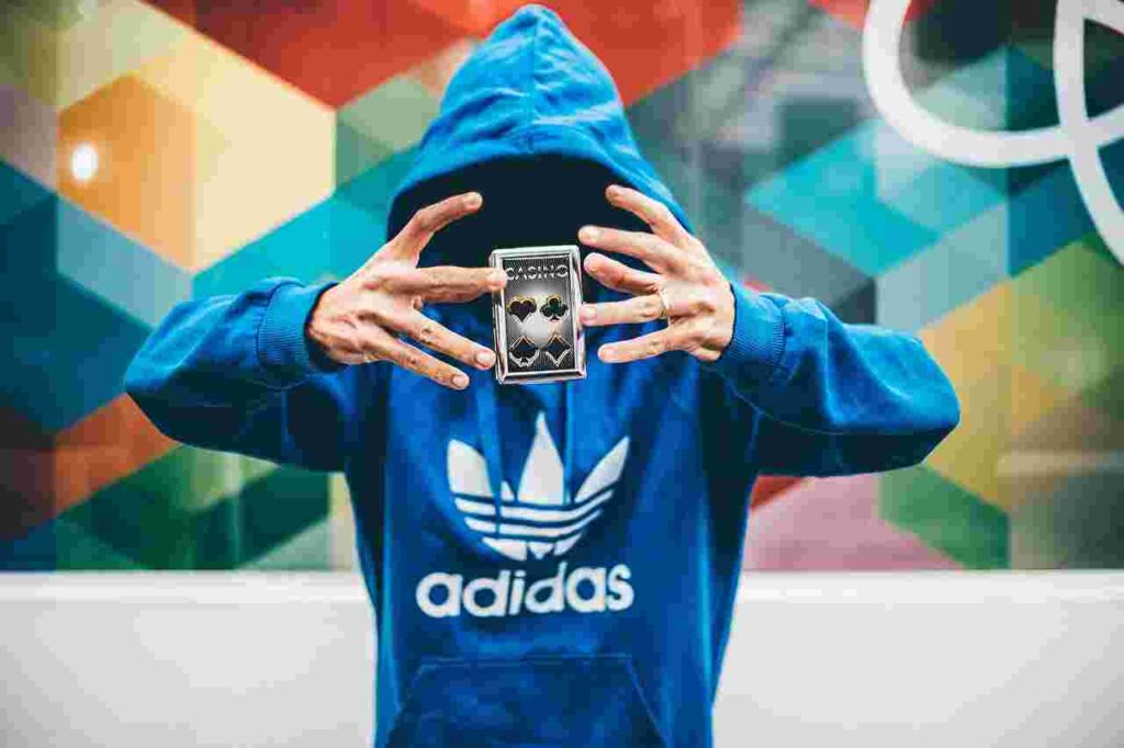 A pair of Adidas sneakers with the iconic three stripes, symbolizing style and innovation.