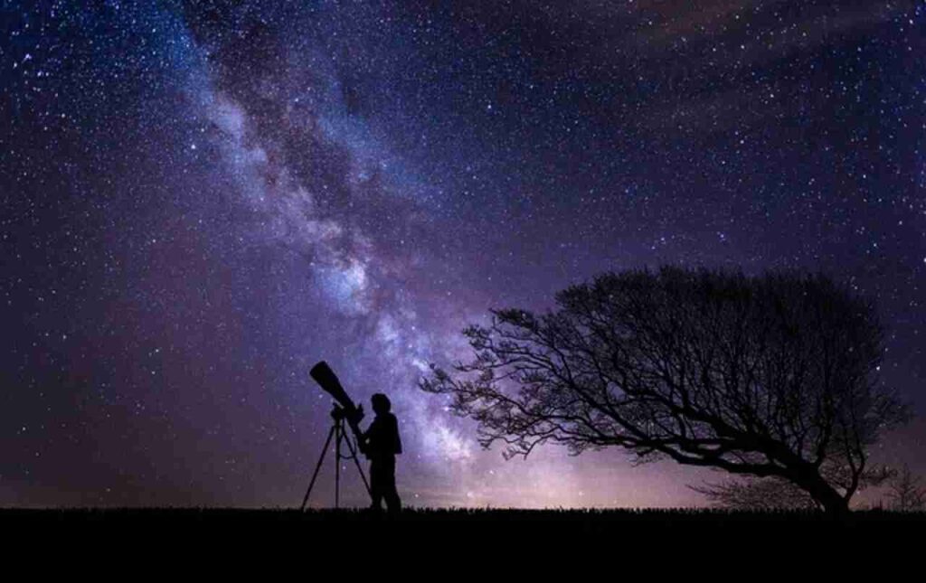 Astronomers studying stars and planets."