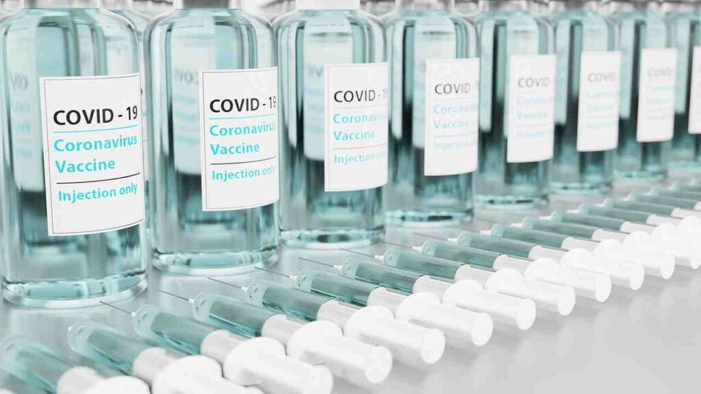 A diverse array of COVID-19 vaccine vials representing different types of vaccines.
