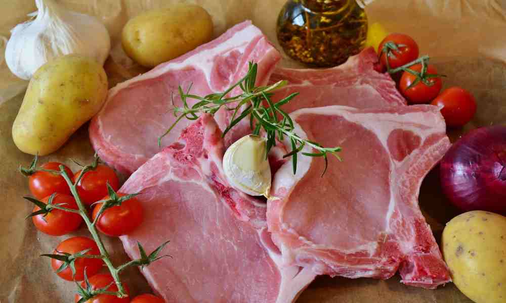 "Selection of healthy meats on a cutting board."