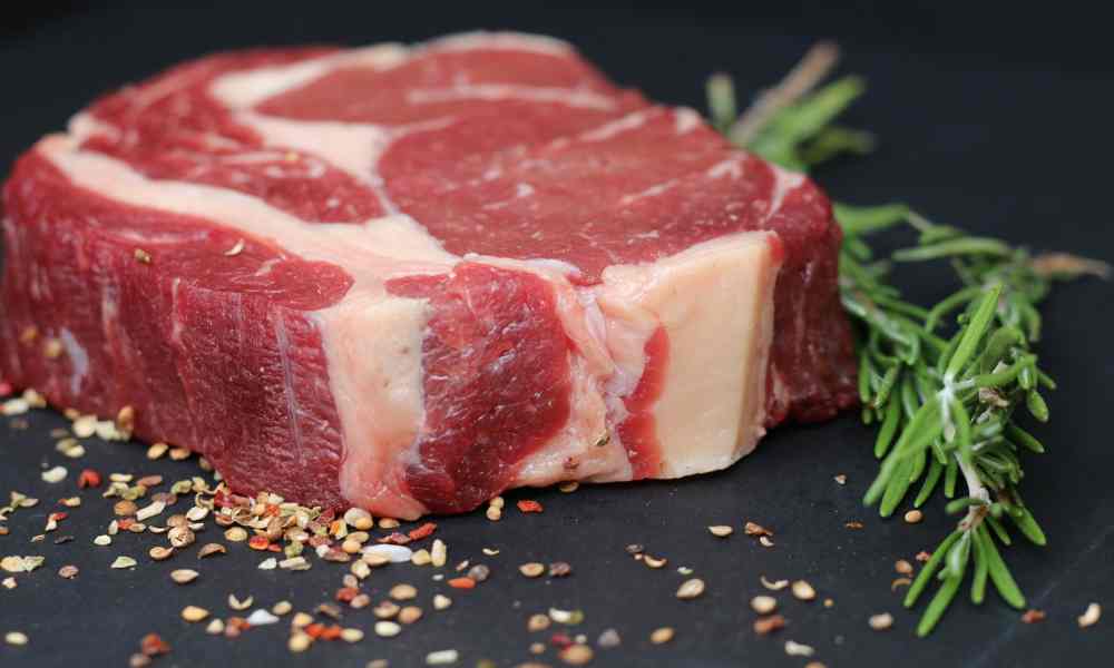 Healthiest Meats "Selection of healthy meats on a cutting board."