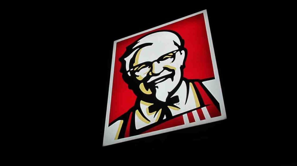 KFC bucket with crispy fried chicken, representing the iconic fast-food brand and its global culinary legacy.