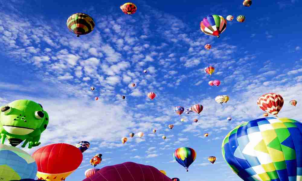 Diverse festival attendees celebrating at America's top great festivals.