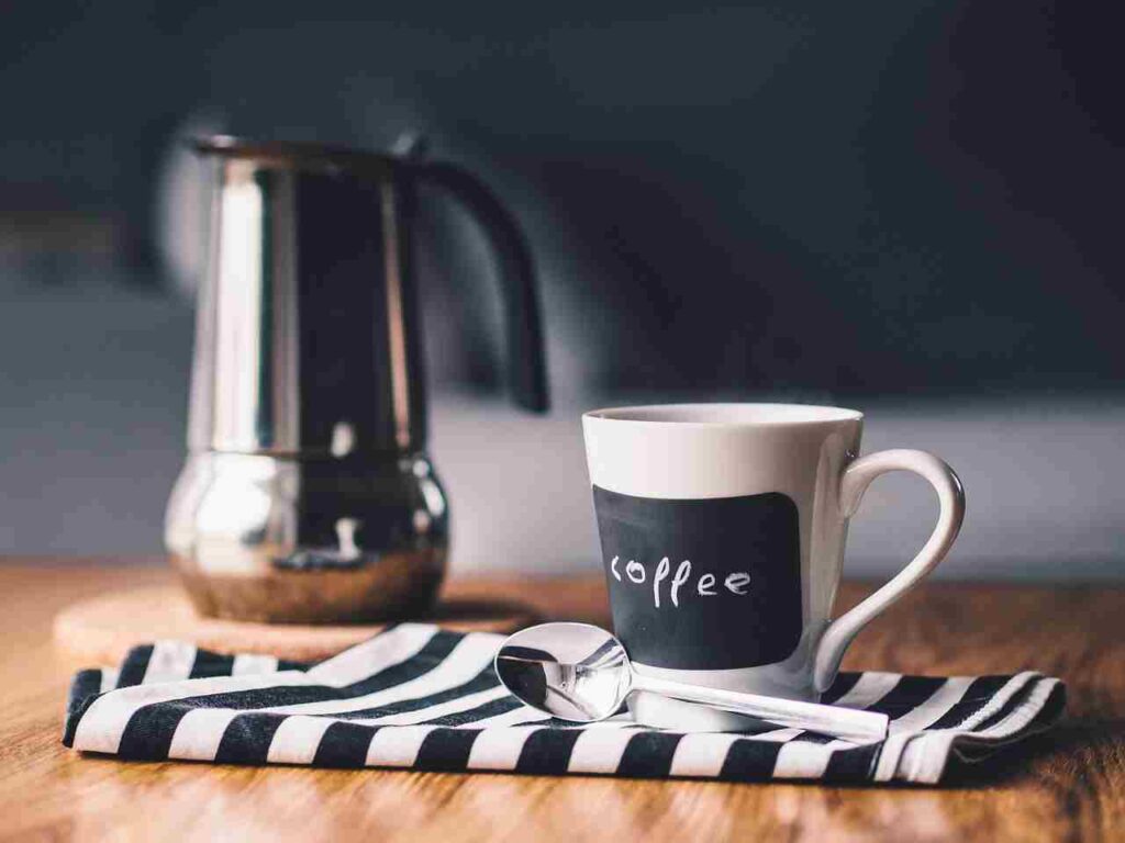 Steaming cup of freshly brewed instant coffee on a cozy morning.