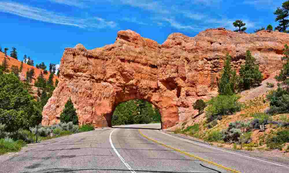Open road with mountains in the distance - perfect for an American road trip adventure!