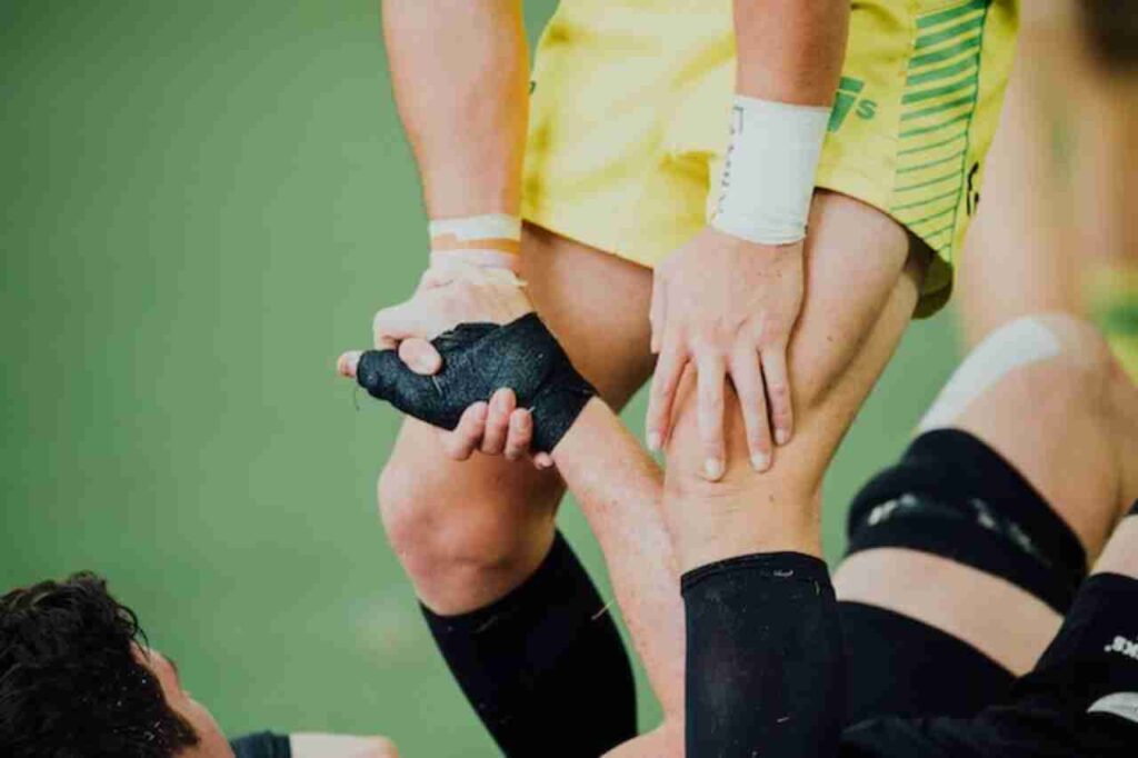 knee pain: "Image: A person performing knee exercises."