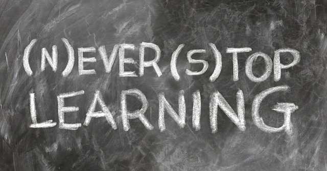 A diverse group of people engaged in learning activities, symbolizing the journey of becoming an educated person.