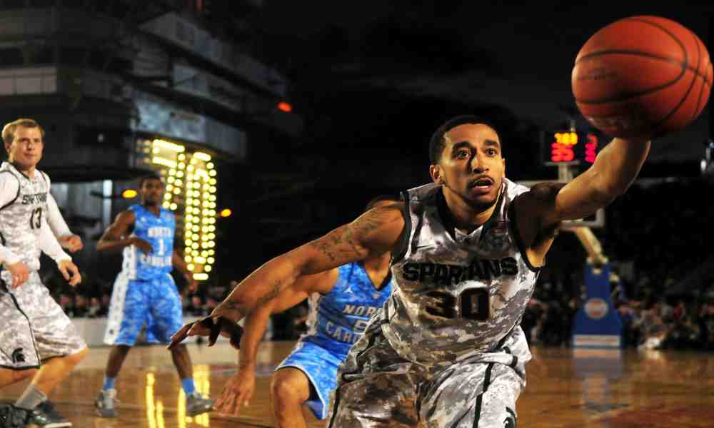 Become an athlete - a person jogging on a track, symbolizing the journey to athletic success.