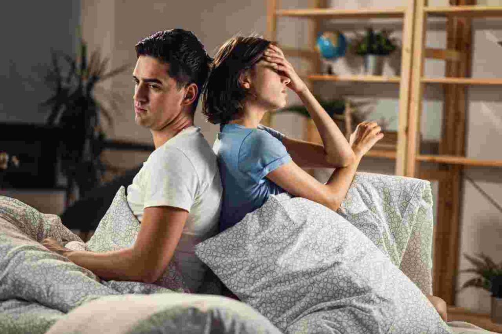 How to Get Over a Breakup: 10 Effective Tips "Image of person embracing themselves, representing self-care after a breakup."