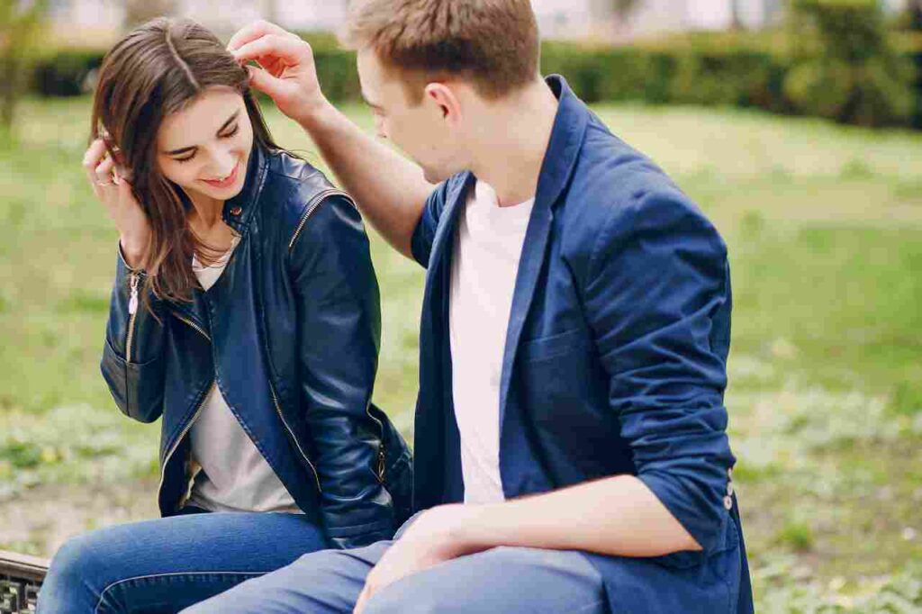 How to Get Over a Breakup: 10 Effective Tips "Image of person embracing themselves, representing self-care after a breakup."