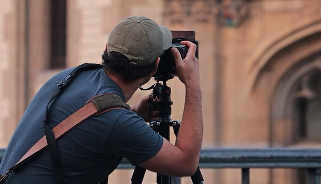 Person happily engaged in a creative hobby, painting on a canvas. How to find a Hobby